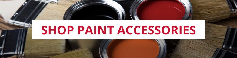 three cans of paint with paint brushes